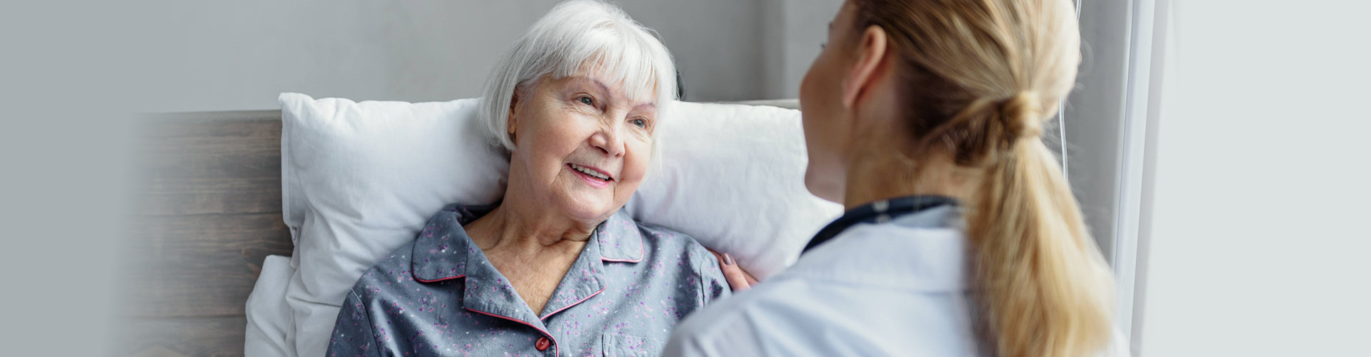 caregiver taking care of elderly